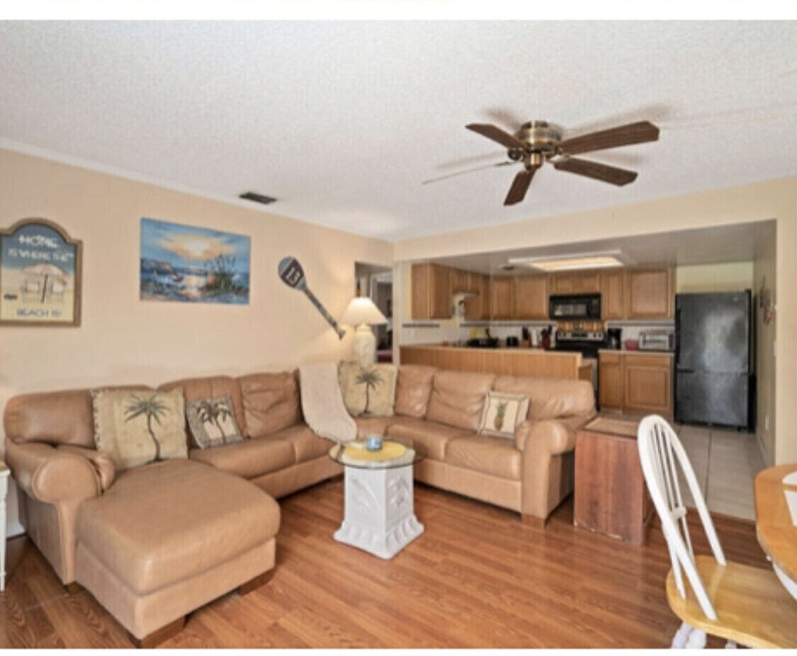 Steps to the beach and park. This is the rear unit with private deck! 