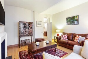 Basic Apartment, 1 King Bed with Sofa bed | Living room | TV