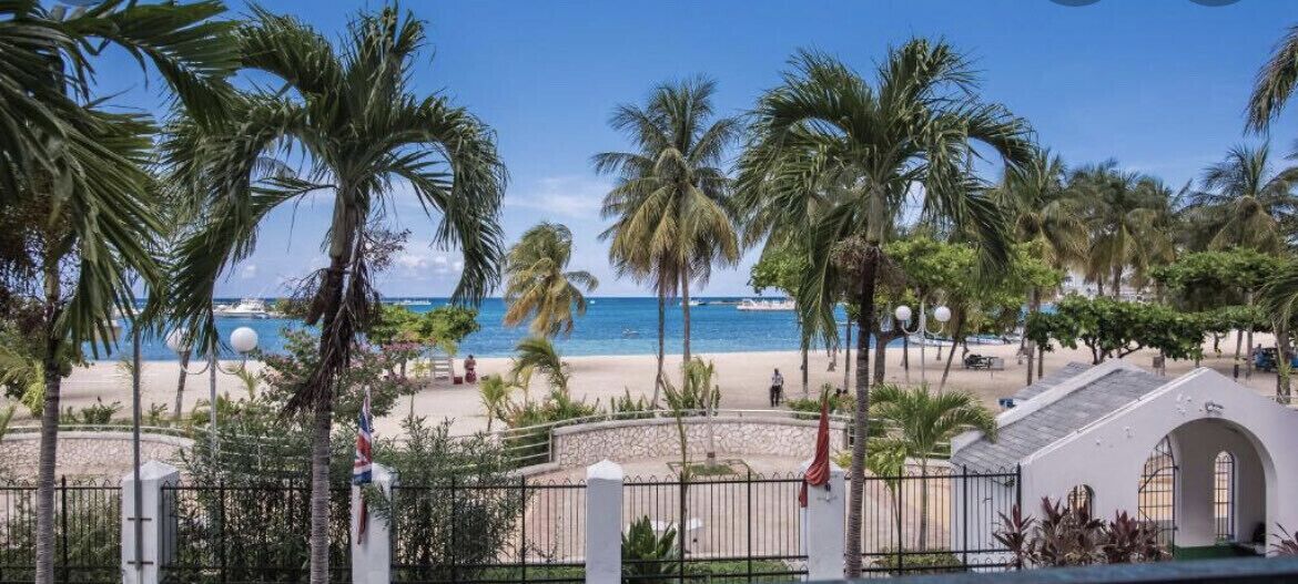 On the beach, sun-loungers