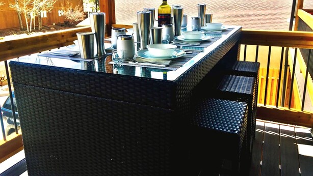 A dining table set outdoors with a mountain view. - The Aspen - in WPCO at 8488 ft elevation (Woodland Park)