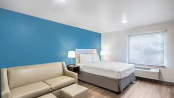 Individually furnished, desk, laptop workspace, iron/ironing board