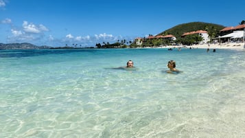 On the beach, sun loungers, beach towels