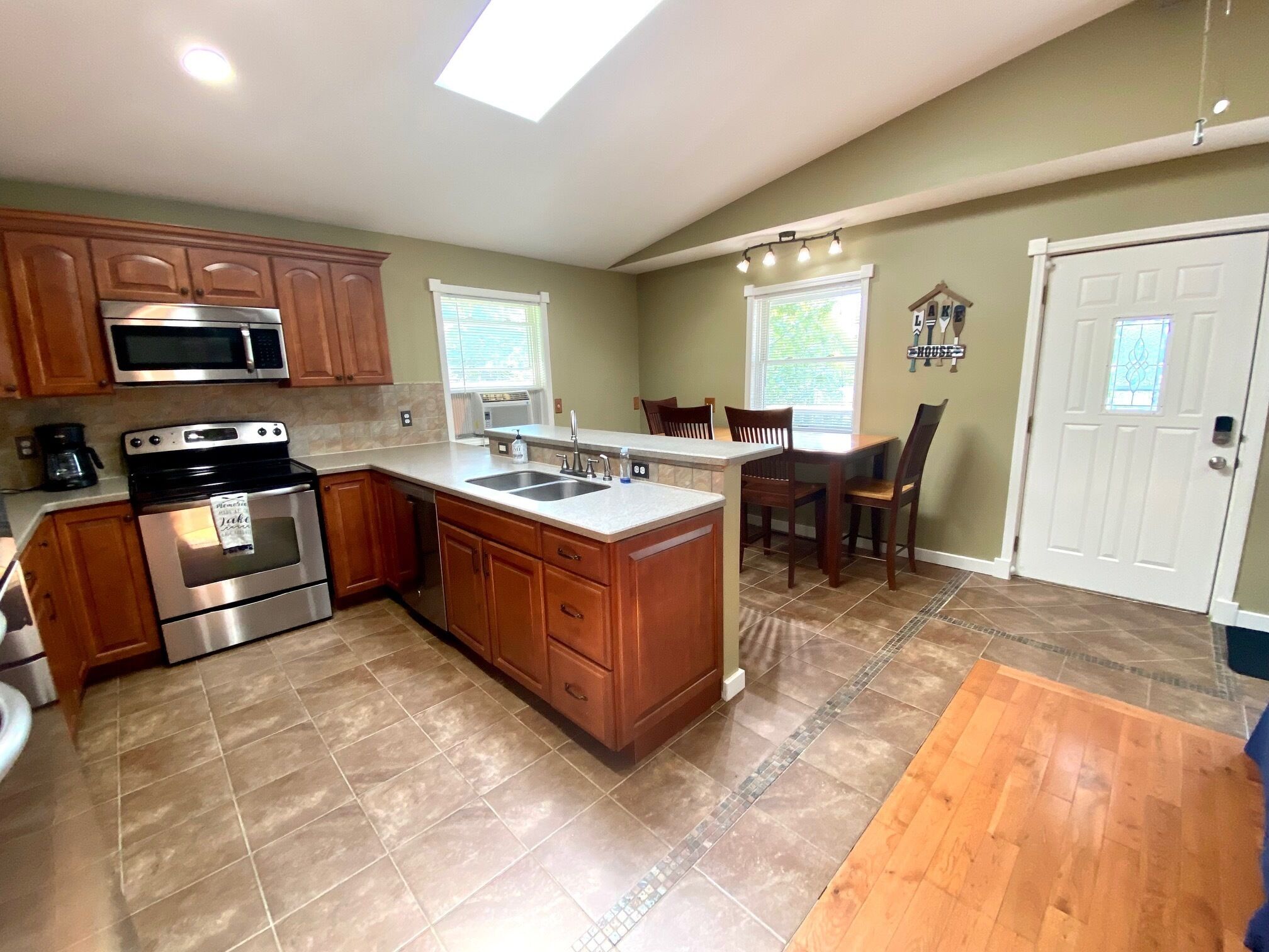 Family friendly lakefront home on all-sports chain of lakes in Genesee County