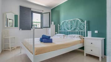 2 dormitorios, tabla de planchar con plancha, wifi gratis y ropa de cama