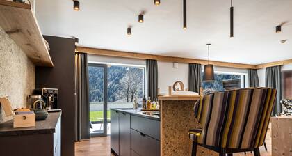 Apartment "Mulin Hilda" next to the Skiing Area with Mountain View, Sauna & Garden
