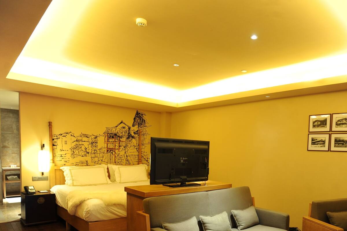 Phòng Suite Elite, quang cảnh vườn | Minibar, két bảo mật tại phòng, màn/rèm cản sáng 