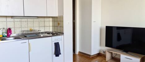 Fridge, microwave, stovetop, coffee/tea maker
