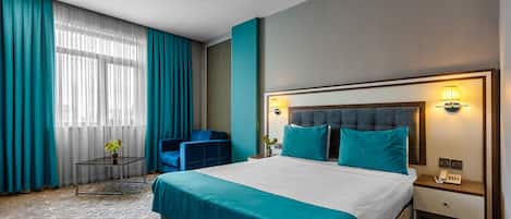 Premium bedding, down duvets, Select Comfort beds, minibar