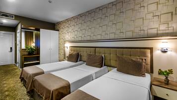 Standard Triple Room | Premium bedding, down comforters, Select Comfort beds, minibar