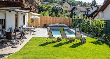Gemütliche Ferienwohnung mit grossem Sonnenbalkon und geheiztem Schwimmbad,