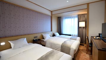 Twin Room(with Sofa Bed) | Down comforters, minibar, in-room safe, desk