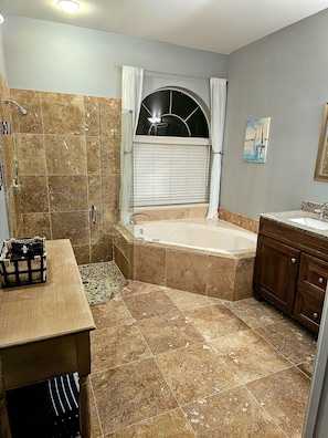Bathtub, hair dryer, towels, soap