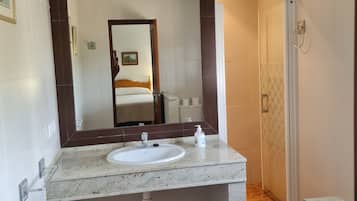 Shower, towels, toilet paper