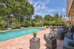 A heated pool, pool loungers