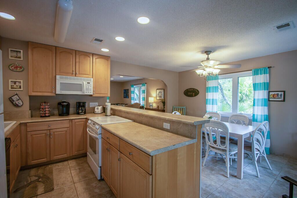 Cozy Family Cottage with WiFi, Private Deck, and Personal Golf Cart