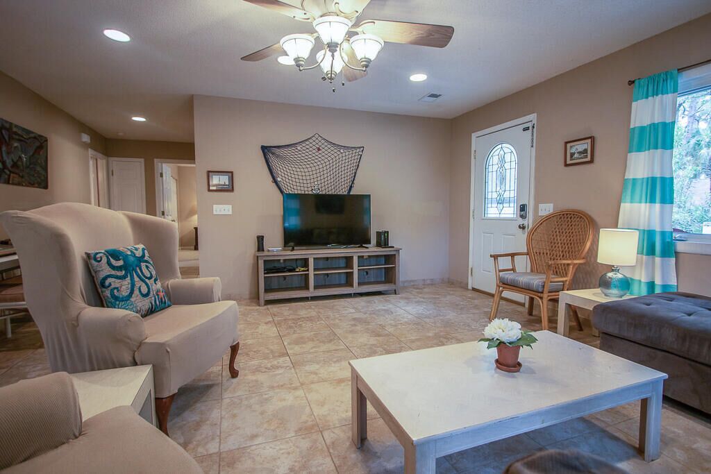 Cozy Family Cottage with WiFi, Private Deck, and Personal Golf Cart