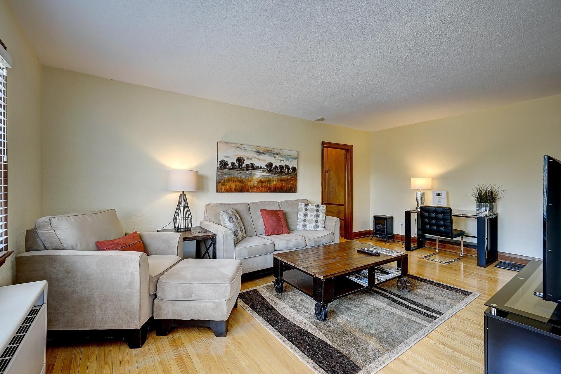 Bright & Airy Second Floor Apartment with Lovely Backyard & Off Street Parking!