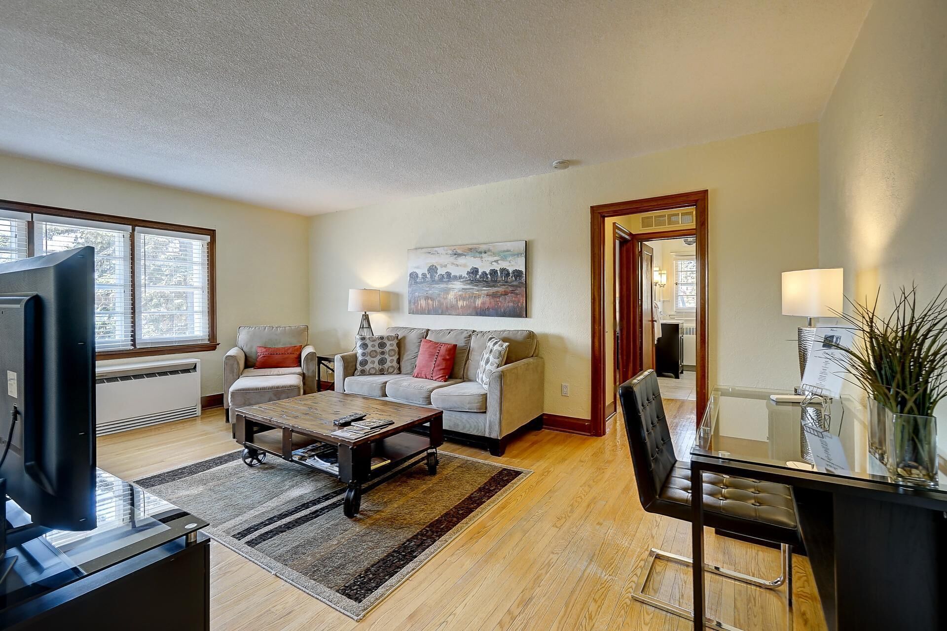 Bright & Airy Second Floor Apartment with Lovely Backyard & Off Street Parking!