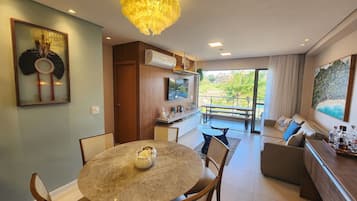 Apartamento conforto | Área de estar | TV de tela plana