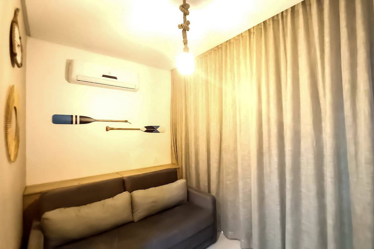 Apartamento conforto | Área de estar | TV de tela plana