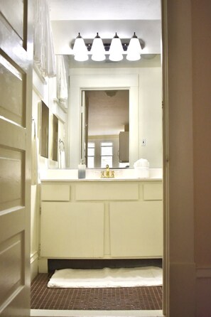 Bathtub, hair dryer, towels