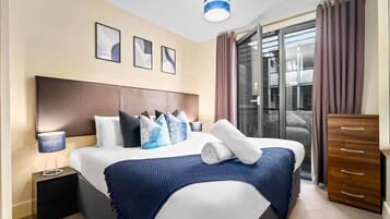 1 bedroom, desk, iron/ironing board, travel cot