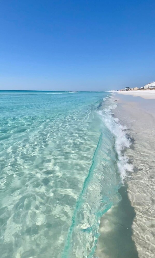 On the beach, sun-loungers