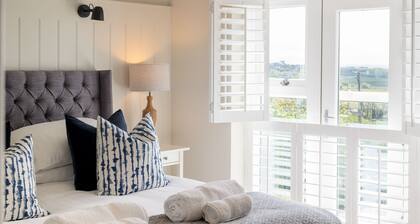 The Nest at The White Eagle : Stylish 4-Bed Coastal Escape in Rhoscolyn | Managed by Anglesey Holida