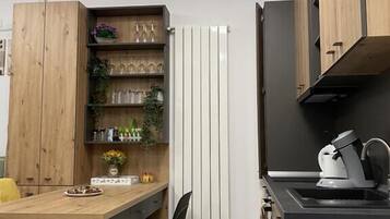 Comfort Apartment | Private kitchen | Fridge, microwave
