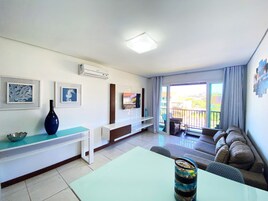 Comfort Apartment | Living area | 32-inch flat-screen TV with satellite channels, TV