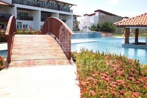 Family Apartment, Balcony, Pool View | Pool | 2 outdoor pools