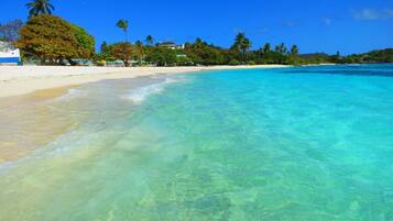 On the beach, sun loungers, beach towels