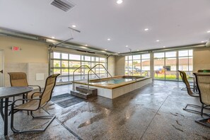 Outdoor pool, a heated pool - Cozy Apartment in Clubhouse building at Woodside Apartments (Mankato)