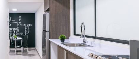 Fridge, microwave, stovetop, cookware/dishes/utensils