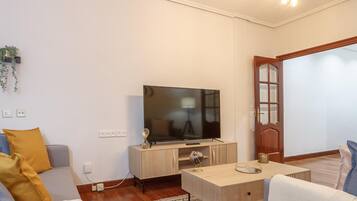 Smart-tv, boeken en een muziekbibliotheek