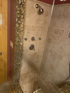 Combined shower/tub, hair dryer, towels, soap