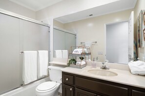 Combined shower/bathtub, hair dryer, towels, soap