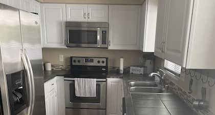 One block to the River, sports park, dogs, AC garage games!