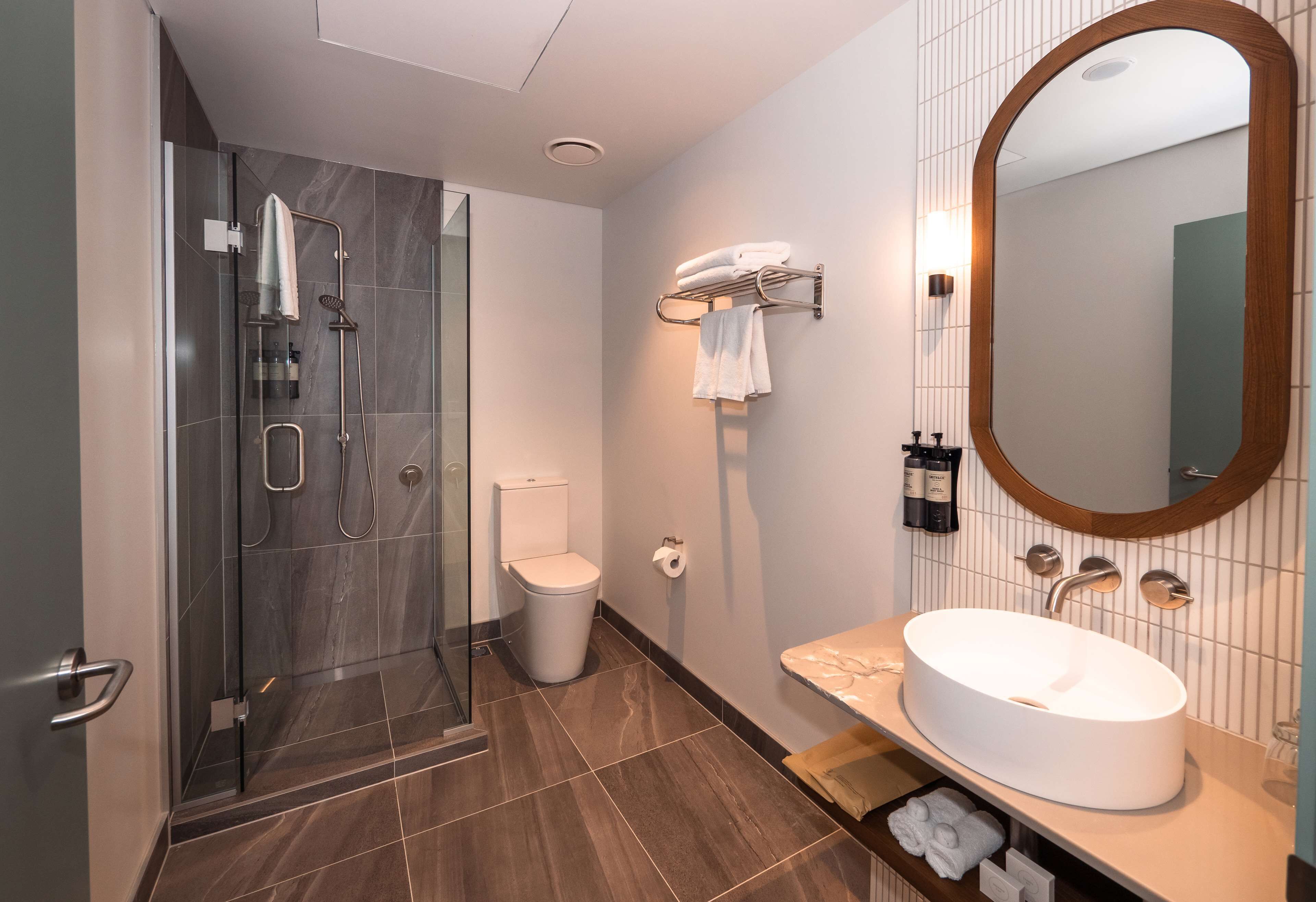 deluxe family | bathroom | shower, eco-friendly toiletries, hair dryer, towels