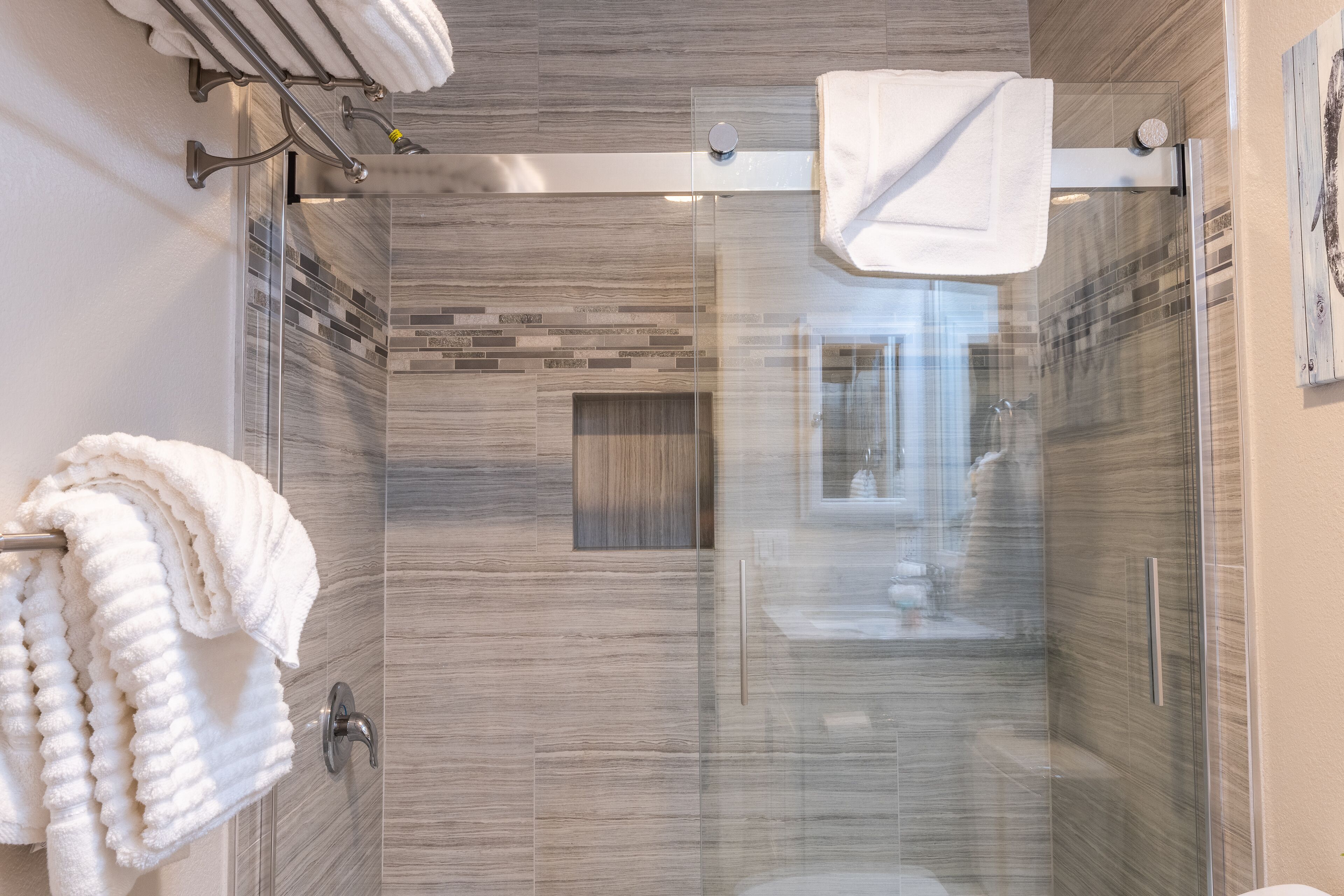 Combined shower/tub, hair dryer, towels, soap