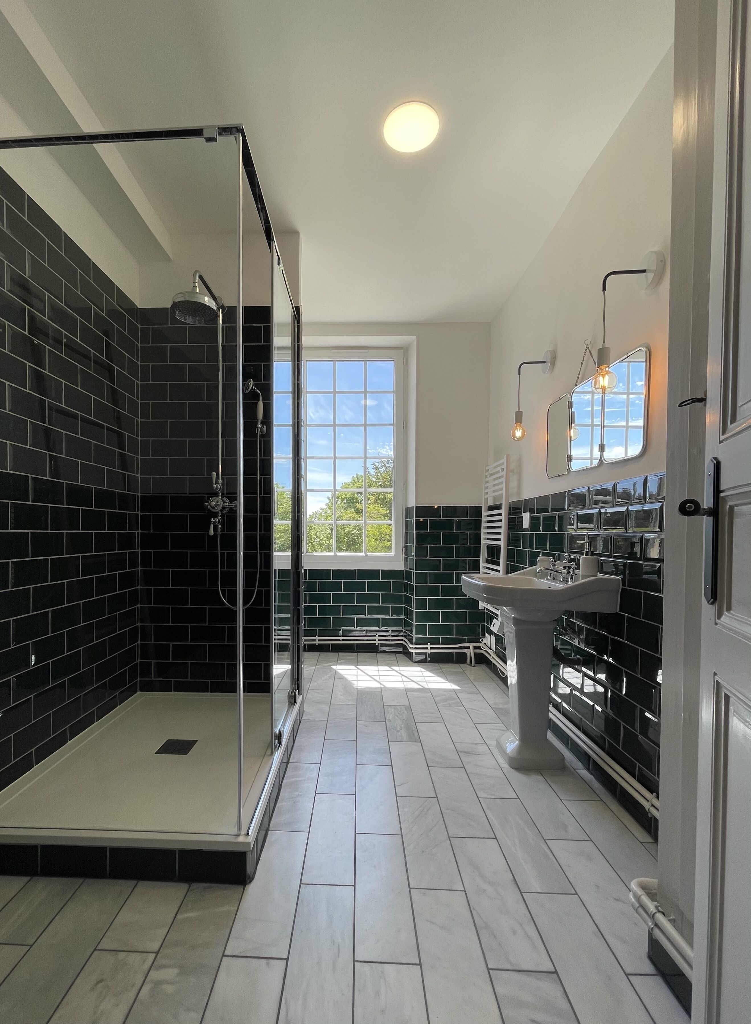 Bathtub, towels, soap, toilet paper