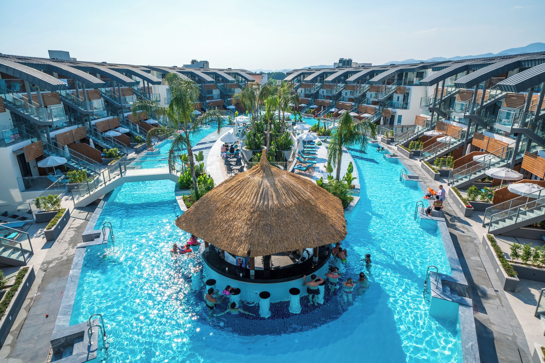 Indoor pool, 13 outdoor pools, pool umbrellas, pool loungers