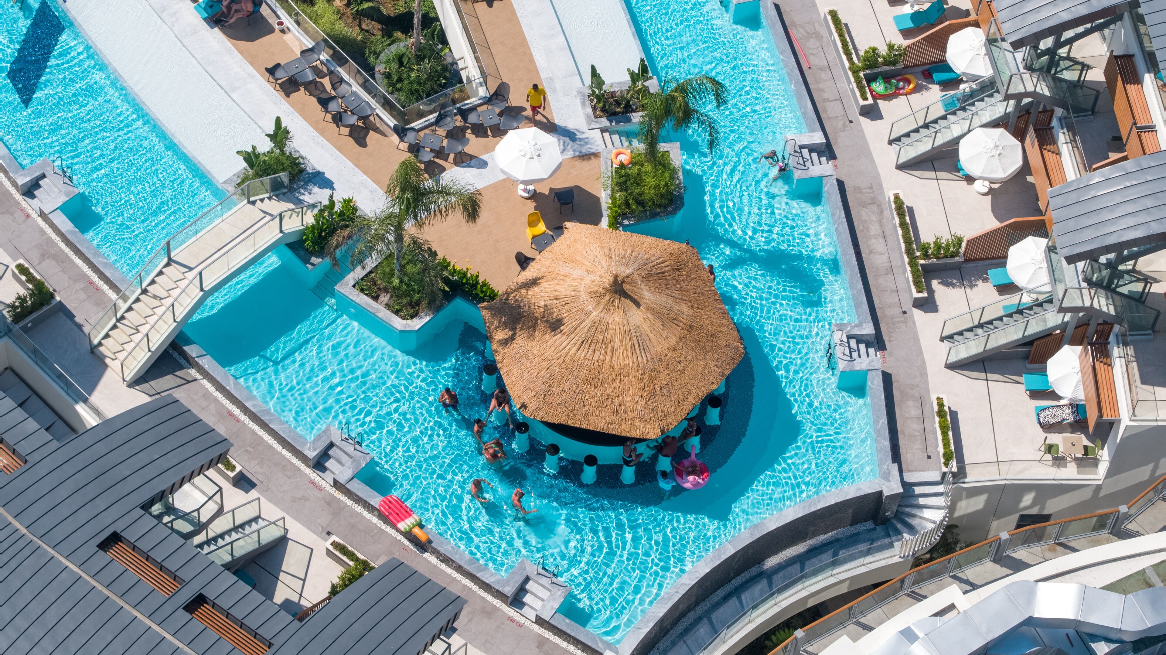 Indoor pool, 13 outdoor pools, pool umbrellas, pool loungers