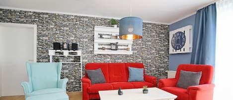 TV, livros, aparelho de som