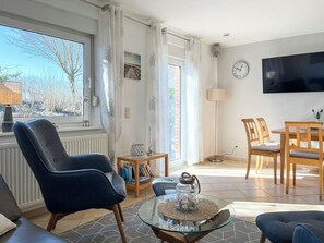 TV, fireplace, books, stereo