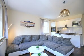 TV, fireplace, books, stereo