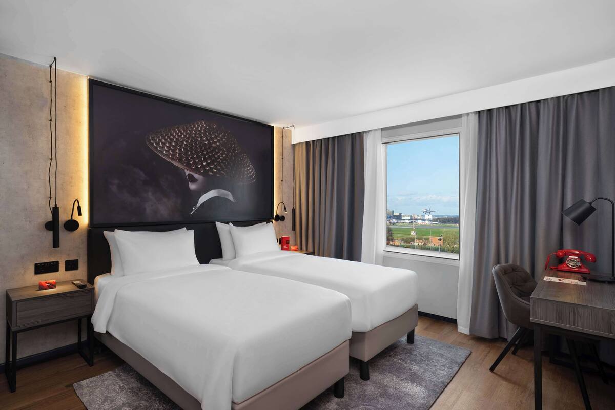 Standard Room (Runway View) | Soundproofing, iron/ironing board (on request), bed sheets