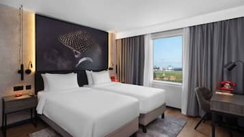 Standard Room (Runway View) | Soundproofing, iron/ironing board, bed sheets