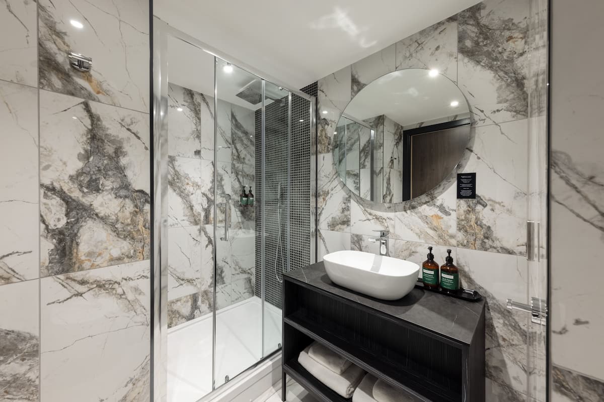 free toiletries, hair dryer, heated floors, towels