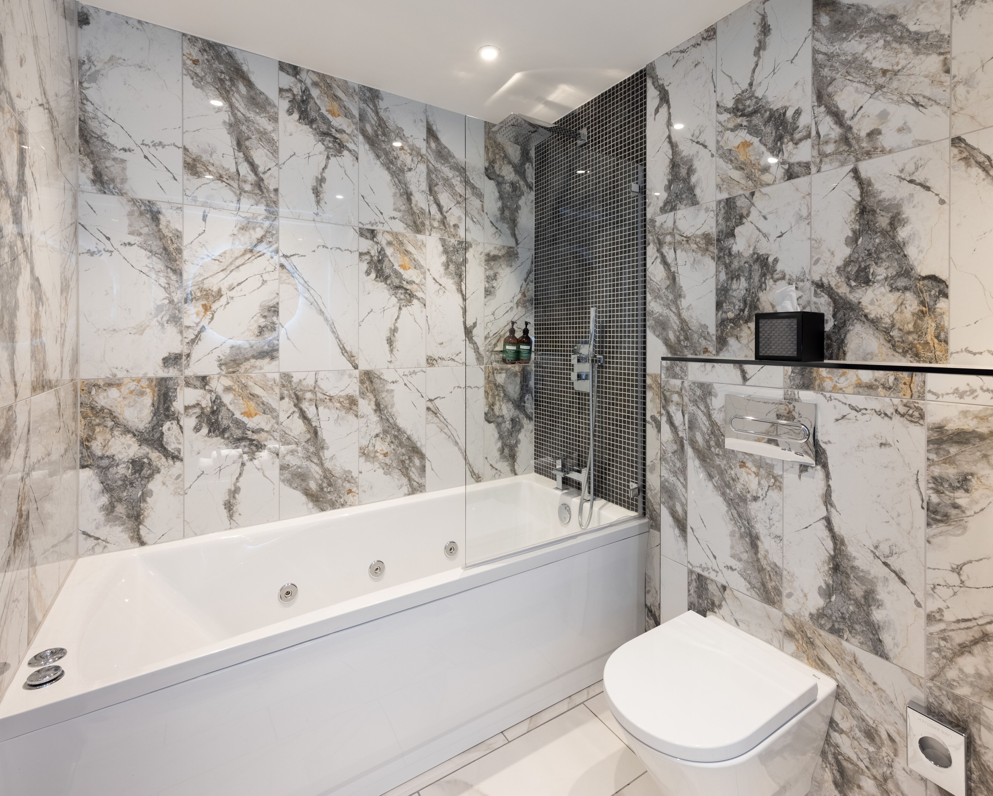 premium room, jetted tub | bathroom | free toiletries, hair dryer, heated floors, towels